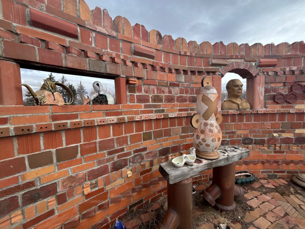 Ceramic sculpture art piece with brickwork on display on the campus of The Archie Bray Foundation in Helena, Montana. Photo by Alyssa Starr, Tempest Technologies.