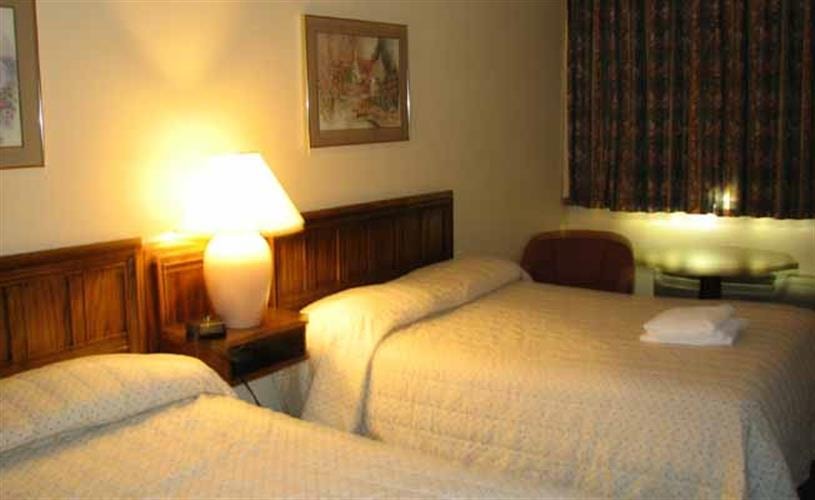 Motel 6: guest room with queen beds