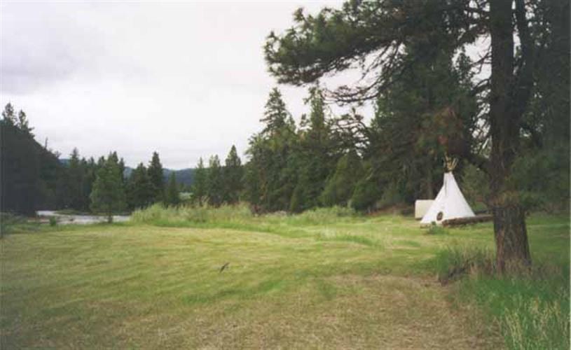 John Maki Outfitters: tepee in meadow
