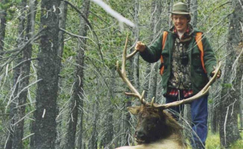 Scapegoat Wilderness Outfitters: man with elk