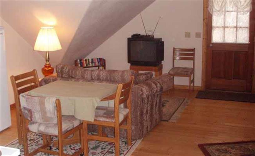 The Carriage House: dining to living room